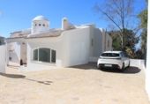 Отдельно стоящий дом с участком на продажу в городе Altea. Фото