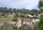 Отдельно стоящий дом с участком на продажу в городе Tortosa. Фото