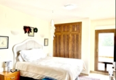Вилла с участком на продажу в городе Benitachell. Фото