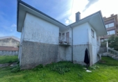 Отдельно стоящий дом с участком на продажу в городе Noja. Фото