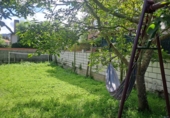 Отдельно стоящий дом с участком на продажу в городе Noja. Фото