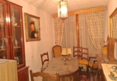 Отдельно стоящий дом с участком на продажу в городе Huéscar. Фото