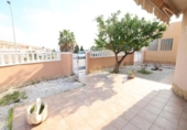 Отдельно стоящий дом с участком на продажу в городе Торревьеха Фото