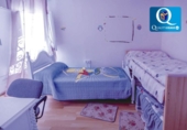 Отдельно стоящий дом с участком на продажу в городе Бенидорм Фото