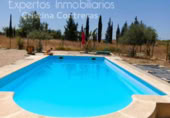 Chalet independiente con terreno en venta en la España, Rociana del Condado, ref: TR140371 foto