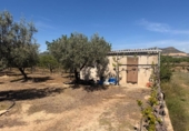 Земля на продажу у города Villar del Arzobispo Фото