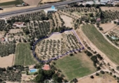 Земля на продажу у города Villa de Otura Фото
