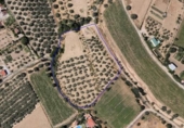 Земля на продажу у города Villa de Otura Фото