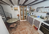 Дом с участком на продажу в городе les Coves de Vinromà. Фото