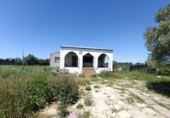 Отдельно стоящий дом с участком на продажу в городе Cullera Фото