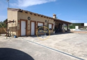 Отдельно стоящий дом с участком на продажу в городе Ontinyent Фото
