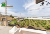 Отдельно стоящий дом с участком на продажу в городе Motril Фото
