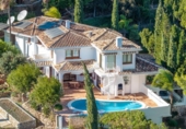 Отдельно стоящий дом с участком на продажу в городе Campo-Mijas Фото