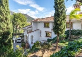 Отдельно стоящий дом с участком на продажу в городе Campo-Mijas Фото