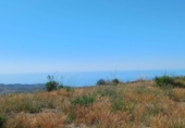 Земля на продажу у города Moclinejo. Фото