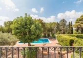 Отдельно стоящий дом с участком на продажу в городе Castellet Фото