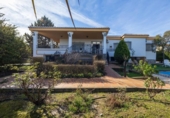 Отдельно стоящий дом с участком на продажу в городе Villa de Otura Фото