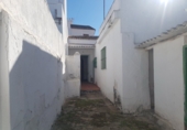 Дом с участком на продажу в городе Cartaya. Фото
