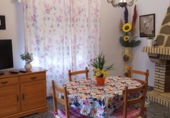 Отдельно стоящий дом с участком на продажу в городе Mengíbar. Фото