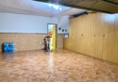 Таунхаус с участком на продажу в городе Малага. Фото