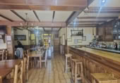 Дом с участком на продажу в городе A Pobra de Trives. Фото
