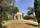 Отдельно стоящий дом с участком на продажу в городе Pinares de Lepe Фото