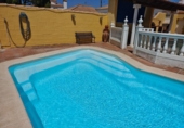 Отдельно стоящий дом с участком на продажу в городе Chiclana de la Frontera Фото