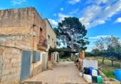 Отдельно стоящий дом с участком на продажу в городе Tortosa Фото