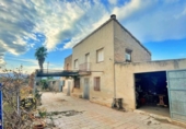 Отдельно стоящий дом с участком на продажу в городе Tortosa Фото