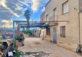 Отдельно стоящий дом с участком на продажу в городе Tortosa Фото