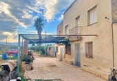 Отдельно стоящий дом с участком на продажу в городе Tortosa Фото
