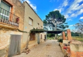 Отдельно стоящий дом с участком на продажу в городе Tortosa Фото