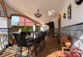 Отдельно стоящий дом с участком на продажу в городе Alcolea Фото