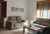 Отдельно стоящий дом с участком на продажу в городе Castelló de Rugat Фото