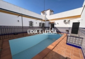 Дом с участком на продажу в городе Alcalá de Guadaíra Фото