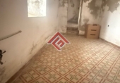 Дом с участком на продажу в городе Трухильо. Фото