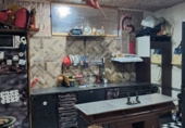 Отдельно стоящий дом с участком на продажу в городе Линарес. Фото