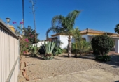 Отдельно стоящий дом с участком на продажу в городе Chiclana de la Frontera Фото