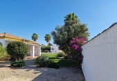 Отдельно стоящий дом с участком на продажу в городе Chiclana de la Frontera Фото