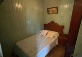 Дом с участком на продажу в городе Оренсе. Фото