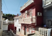 Отдельно стоящий дом с участком на продажу в городе Vélez-Málaga Фото