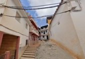 Отдельно стоящий дом с участком на продажу в городе Vélez-Málaga Фото