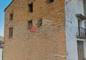 Дом с участком на продажу в городе Villafranca del Cid. Фото