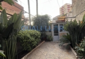 Отдельно стоящий дом с участком на продажу в городе Sant Feliu de Llobregat Фото