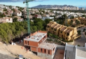 Отдельно стоящий дом с участком на продажу в городе Finestrat Фото