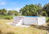 Отдельно стоящий дом с участком на продажу в городе Chiclana de la Frontera. Фото