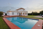 Chalet independiente con terreno en venta en la España, Sanlúcar la Mayor, ref: TR410102 foto