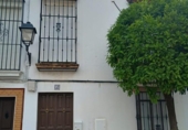 Дом с участком на продажу в городе La Puebla de Cazalla Фото