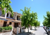 Отдельно стоящий дом с участком на продажу в городе Los Alcázares Фото