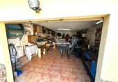 Отдельно стоящий дом с участком на продажу в городе Calafell Фото